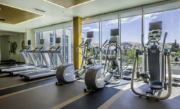 FiT: Tech-Driven Fitness Center with Personal TVs on Cardio Machines